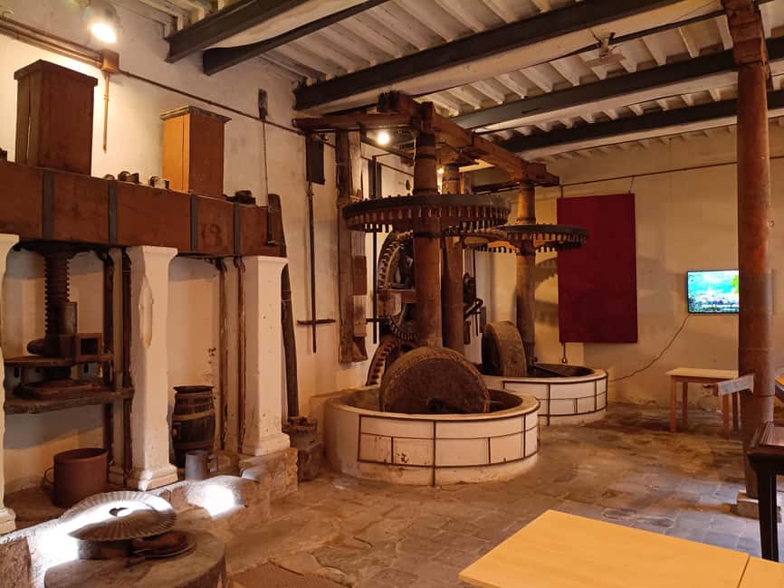 Buti: Olive Oil Ancient Mill Tour and Tasting Experience - Meeting at the Oleoteca di Buti