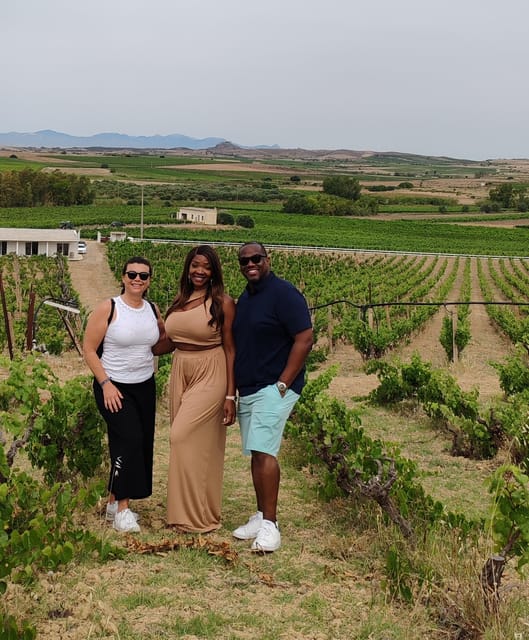 Cagliari: Wine and Olive oil Experience + Oil Mill Museum - Walking the vineyard with the winemaker