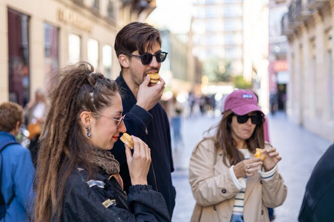 Malaga Food Tour with 12+ Tastings: Tapas, Olive Oil, Ham & More - Timing, weather, and cancellation details