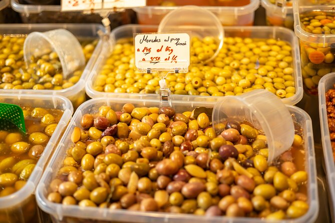 Malaga Food Tour with 12+ Tastings: Tapas, Olive Oil, Ham & More - Atarazanas Market is the tour’s main food lesson