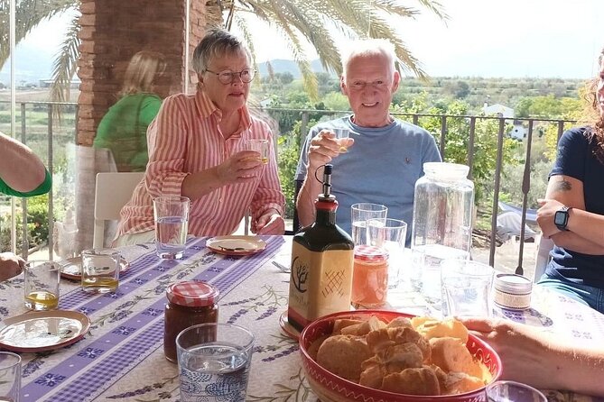 Olive Oil Tour and Tasting in Málaga - A farm table with local food