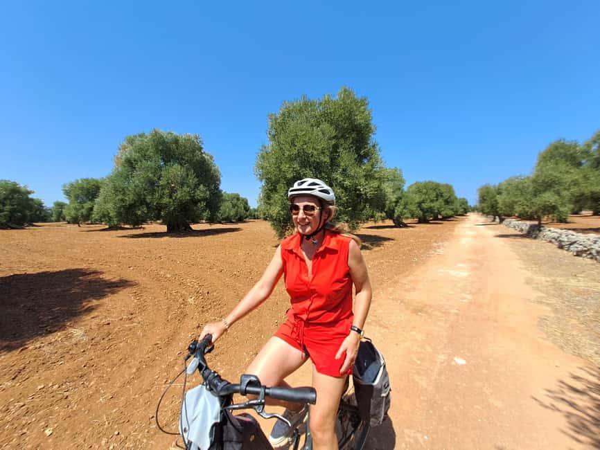 Ostuni: Guided e-bike tour to rock village & olive trees - Entering the ancient rock village