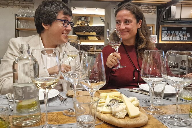Rome Tasting Experience: Wine, Olive Oil and Local Bites - Cured meats and cheeses turn it into a proper food experience