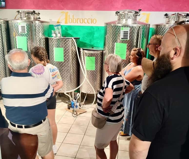 Seggiano: Guided Tour of the Olive Grove and Food Tasting - Walking From the Trees to the Cellar